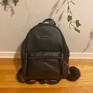 Unused faux black leather mini backpack